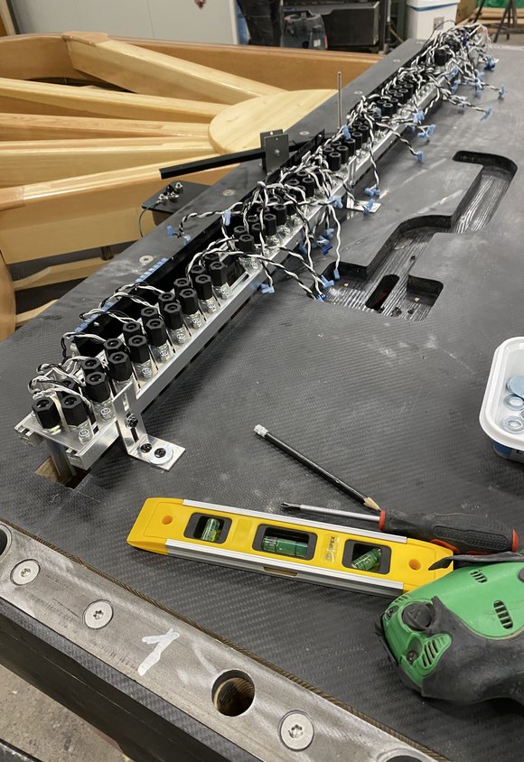 QRS PNOmation solenoid rail wired on a grand piano keybed